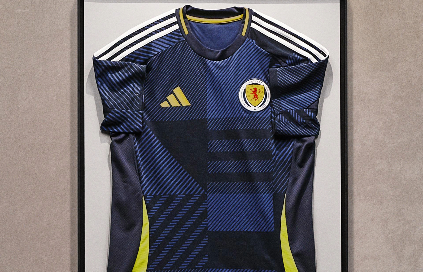 The Scotland home kit features tartan patterns.