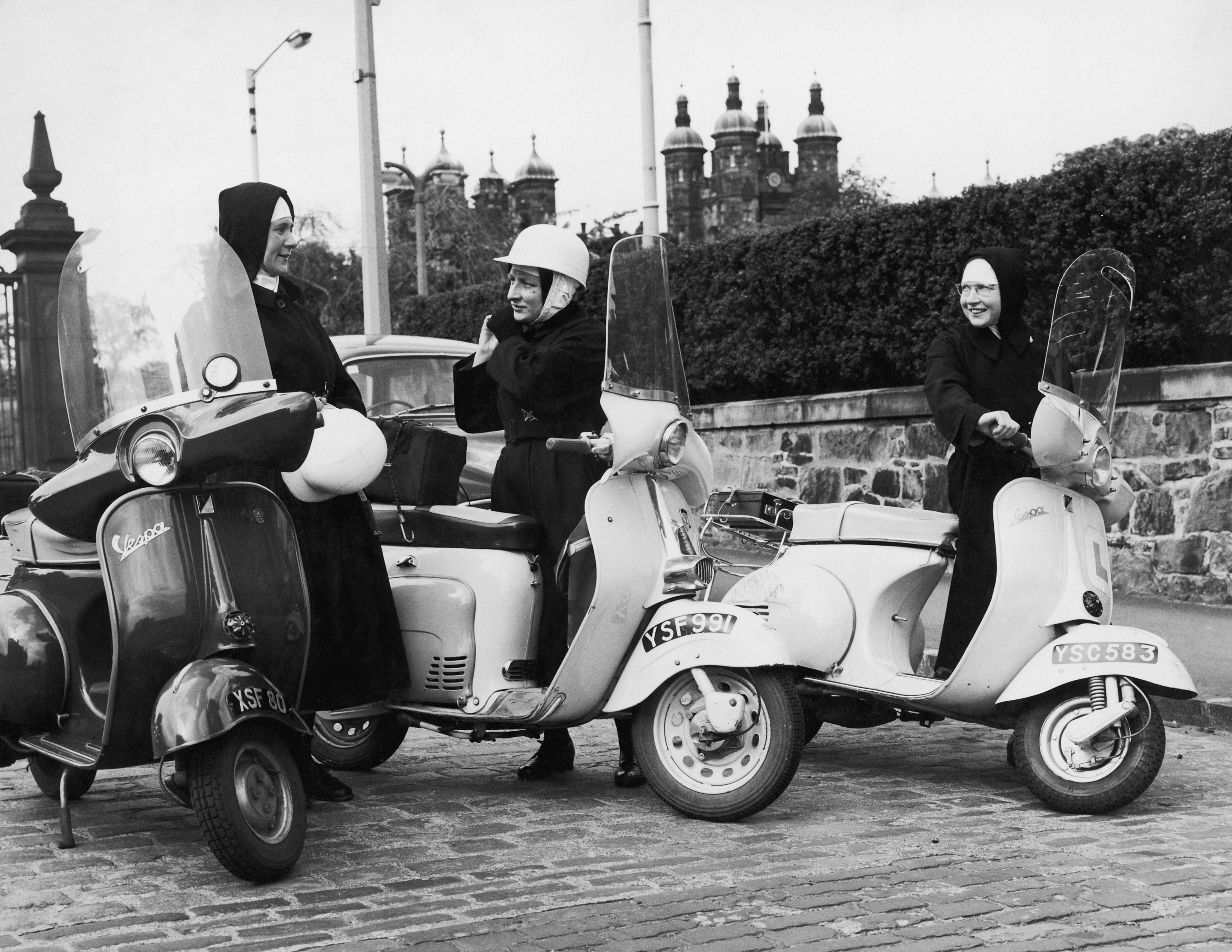 Sisters Stephen, Imelda and Patrick with their motor scooters, Edinburgh, circa 1970. The nuns, of nursing order The Little Sisters Of The Assumption, used their scooters to attend urgent cases of illness in the working class communities of the city. (Photo by Daily Express/Hulton Archive/Getty Images)