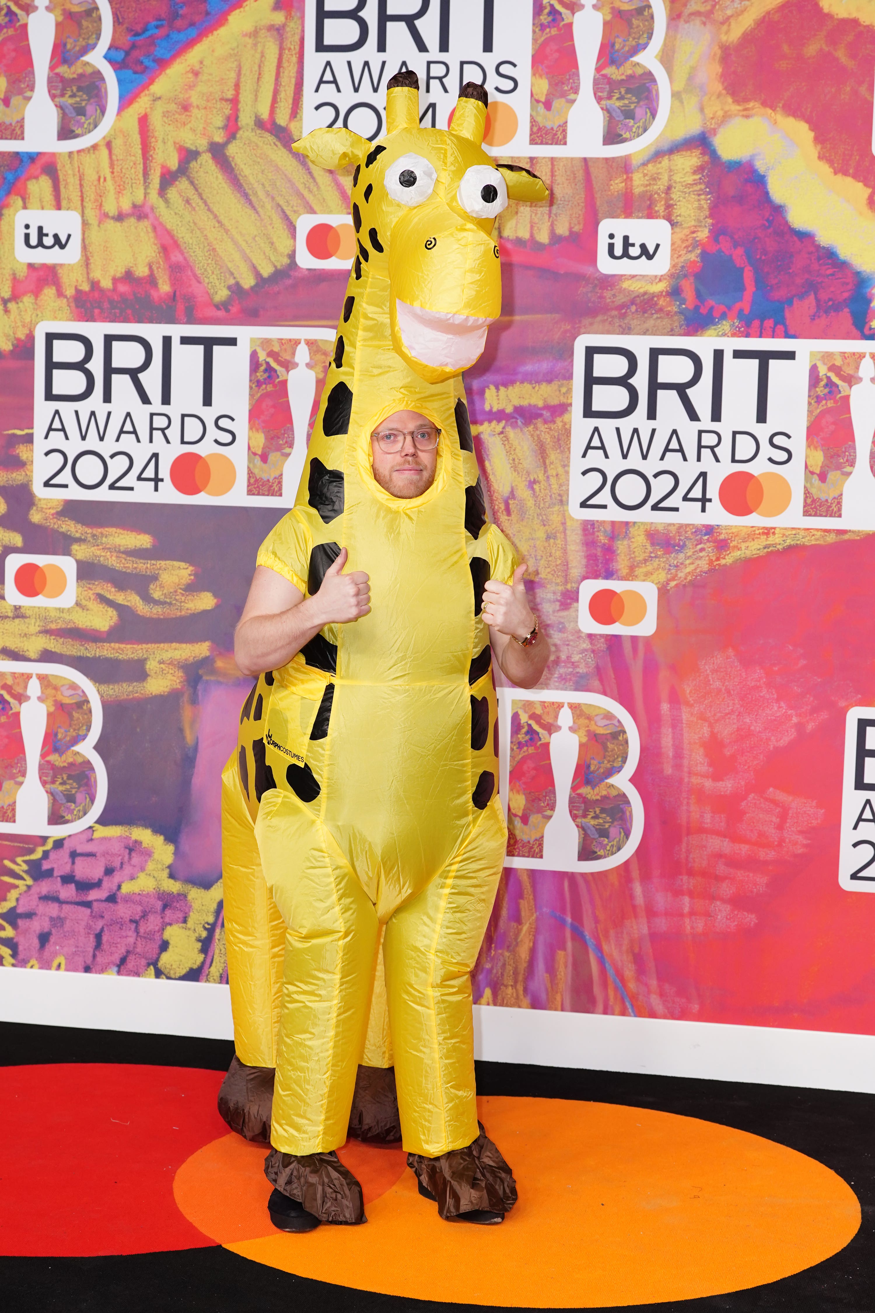 Rob Beckett wore an inflatable giraffe outfit to the Brit Awards.