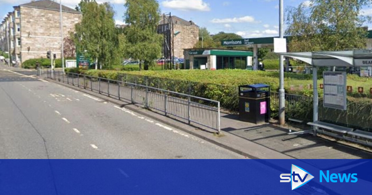 Woman left in hospital after being struck by car outside shop in ...