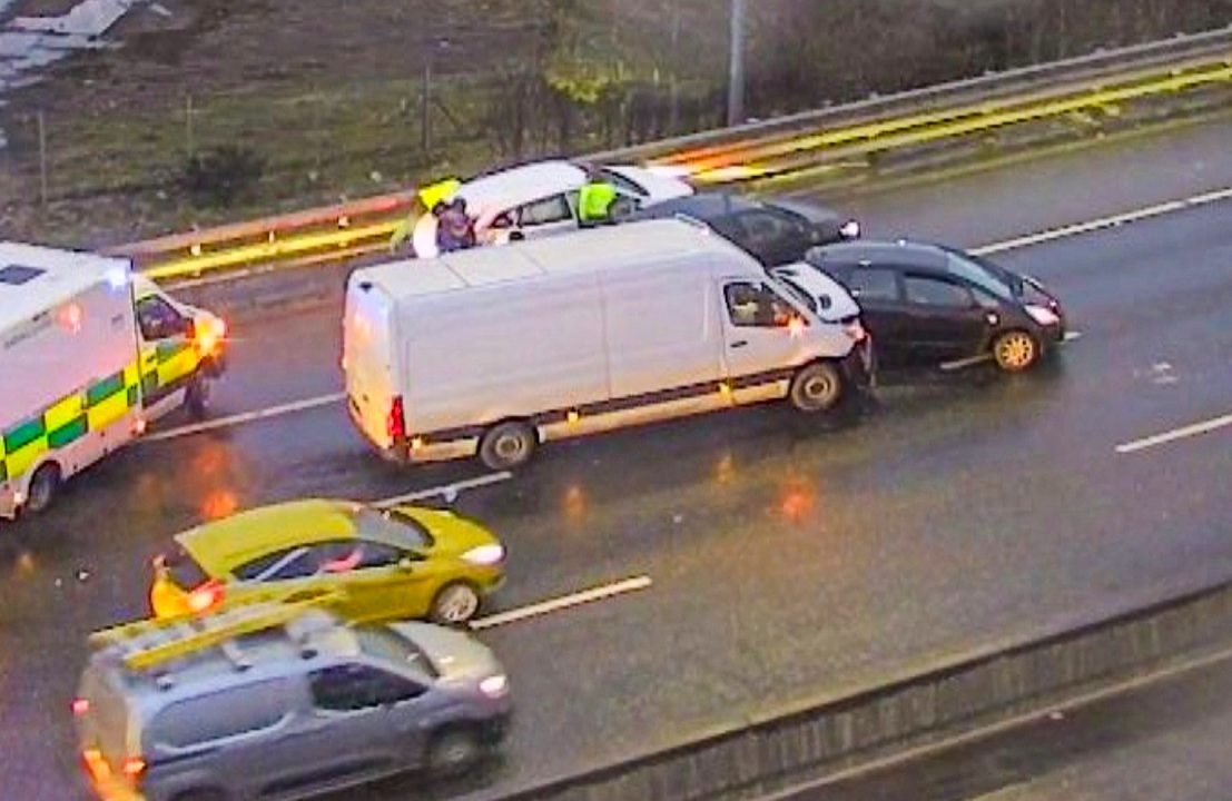 Three in hospital after four-vehicle crash blocks M74 at rush hour