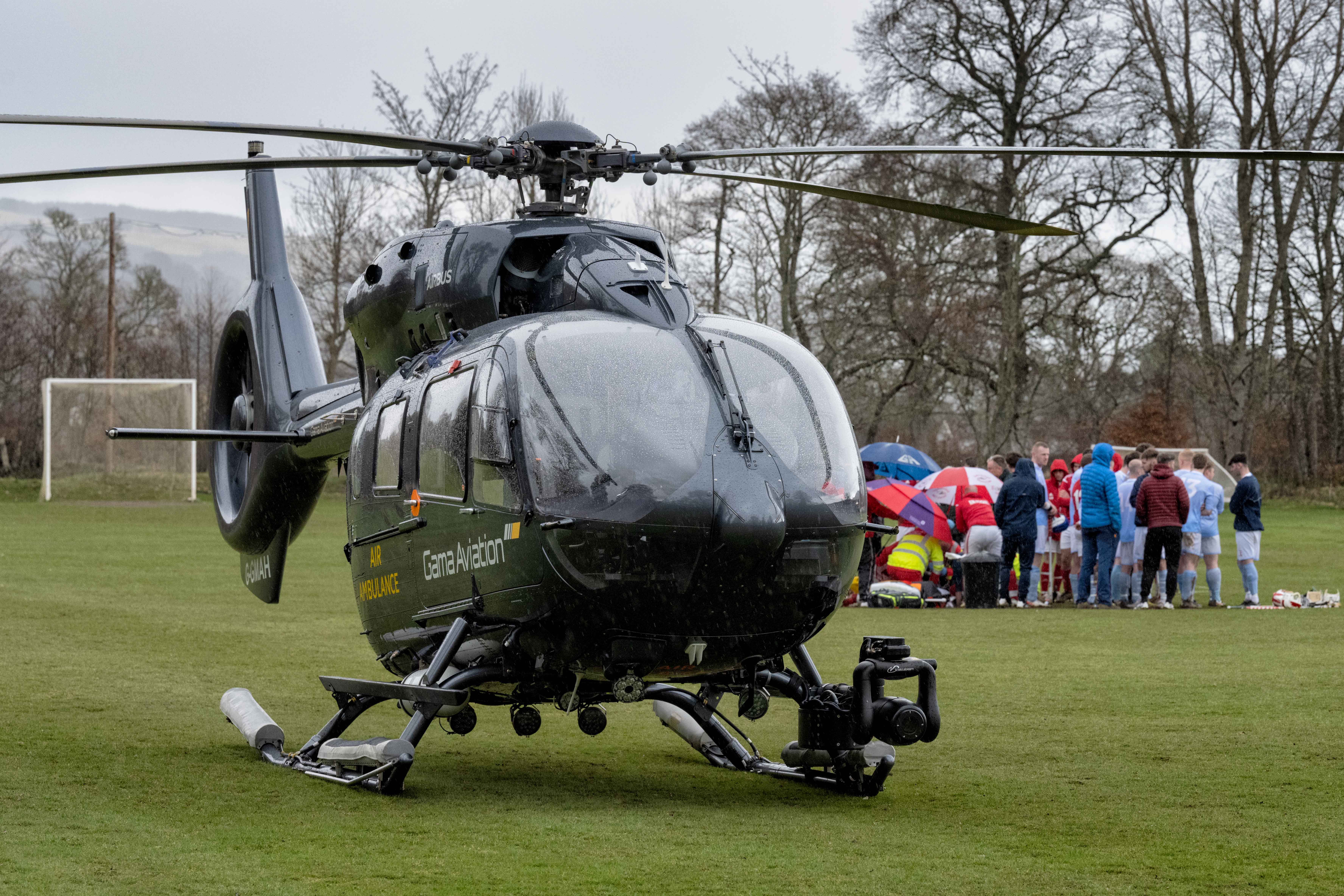 The Air Ambulance had landed on the shinty pitch and medical assistance was continued for the referee Steven MacLachlan.