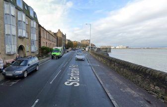 Pedestrian taken to hospital and road closed after crash in Edinburgh