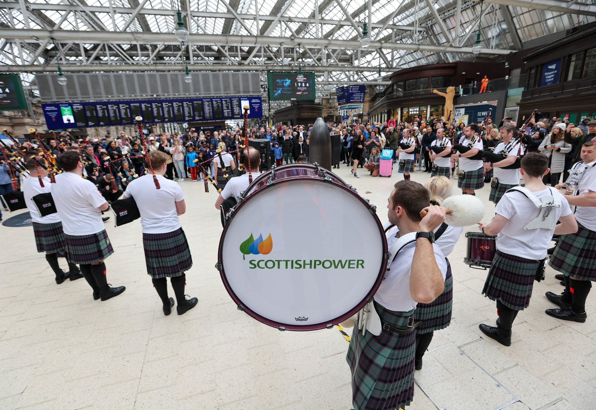 Members of Scottish Power's group conducted a live performance for commuters inside the station.