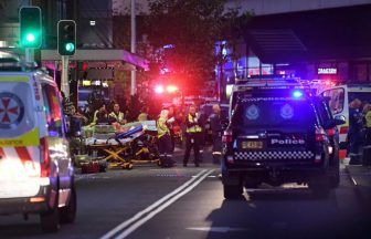 Man shot dead by police after killing six people in stabbing spree at Sydney shopping centre