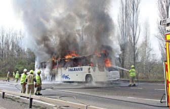 Coach bursts into flames closing down A725 East Kilbride Expressway