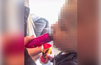 Two women charged after videos of toddler vaping shared online