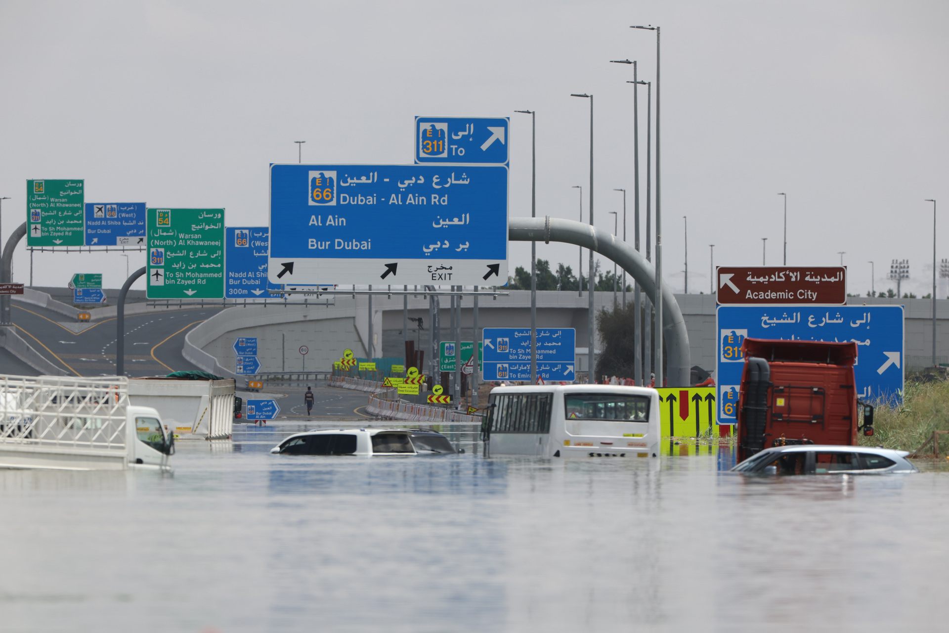 Abandoned vehicles on a flooded highway after a rainstorm in Dubai, United Arab Emirates, on Wednesday.