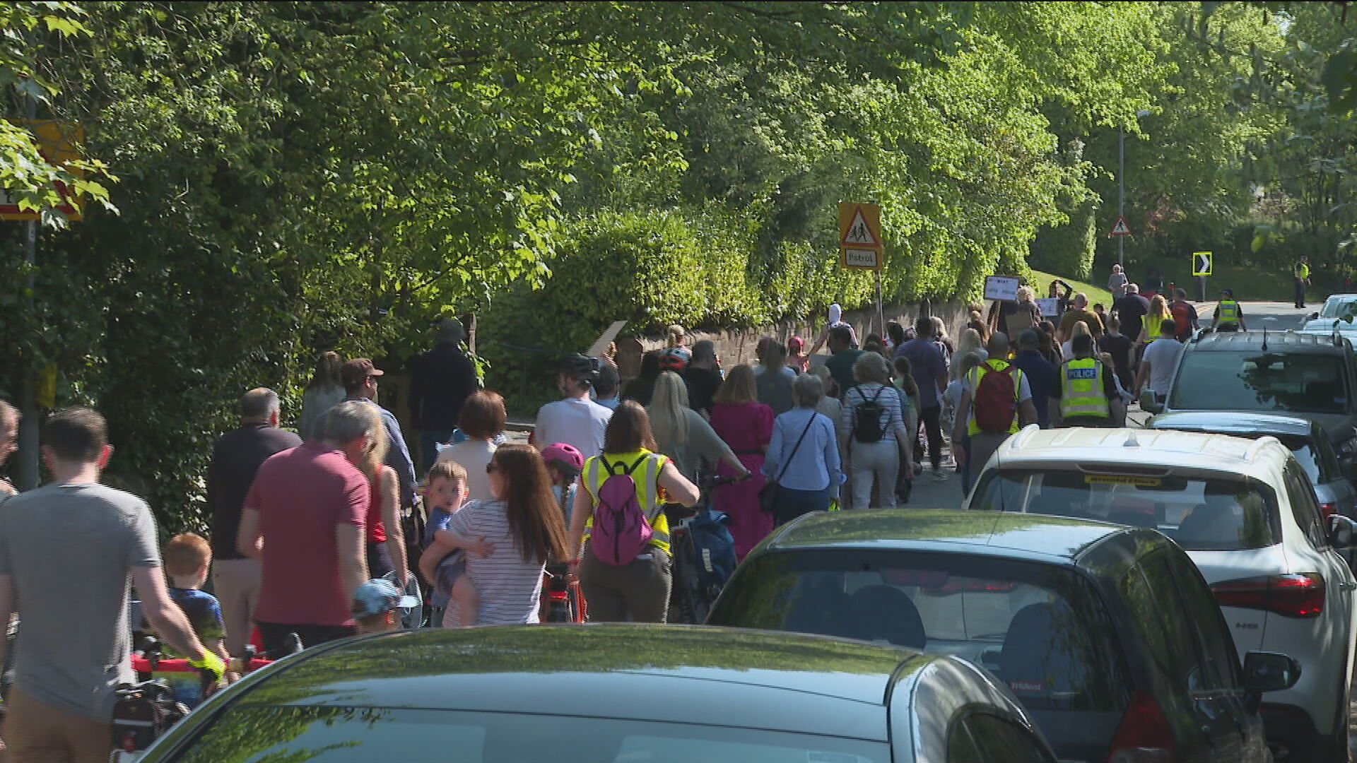 Hundreds of local residents walked through the town on Saturday calling for improved road safety.