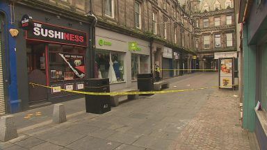 Two men appear in court charged with attempted murder of man and robbery in Inverness