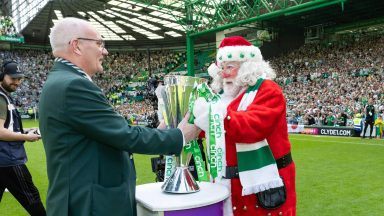 Santa delivers Premiership trophy to Celtic six months after being booed