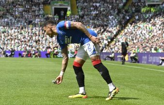 GLASGOW, SCOTLAND - MAY 11: Rangers James Tavernier picks up an object thrown at him from the Celtic fans during a cinch Premiership match between Celtic and Rangers at Celtic Park, on May 11, 2024, in Glasgow, Scotland. (Photo by Rob Casey / SNS Group)