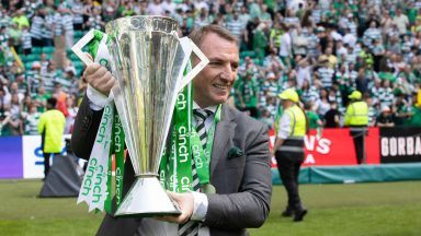 A brilliant day: Brendan Rodgers savours moment as Celtic awarded league trophy