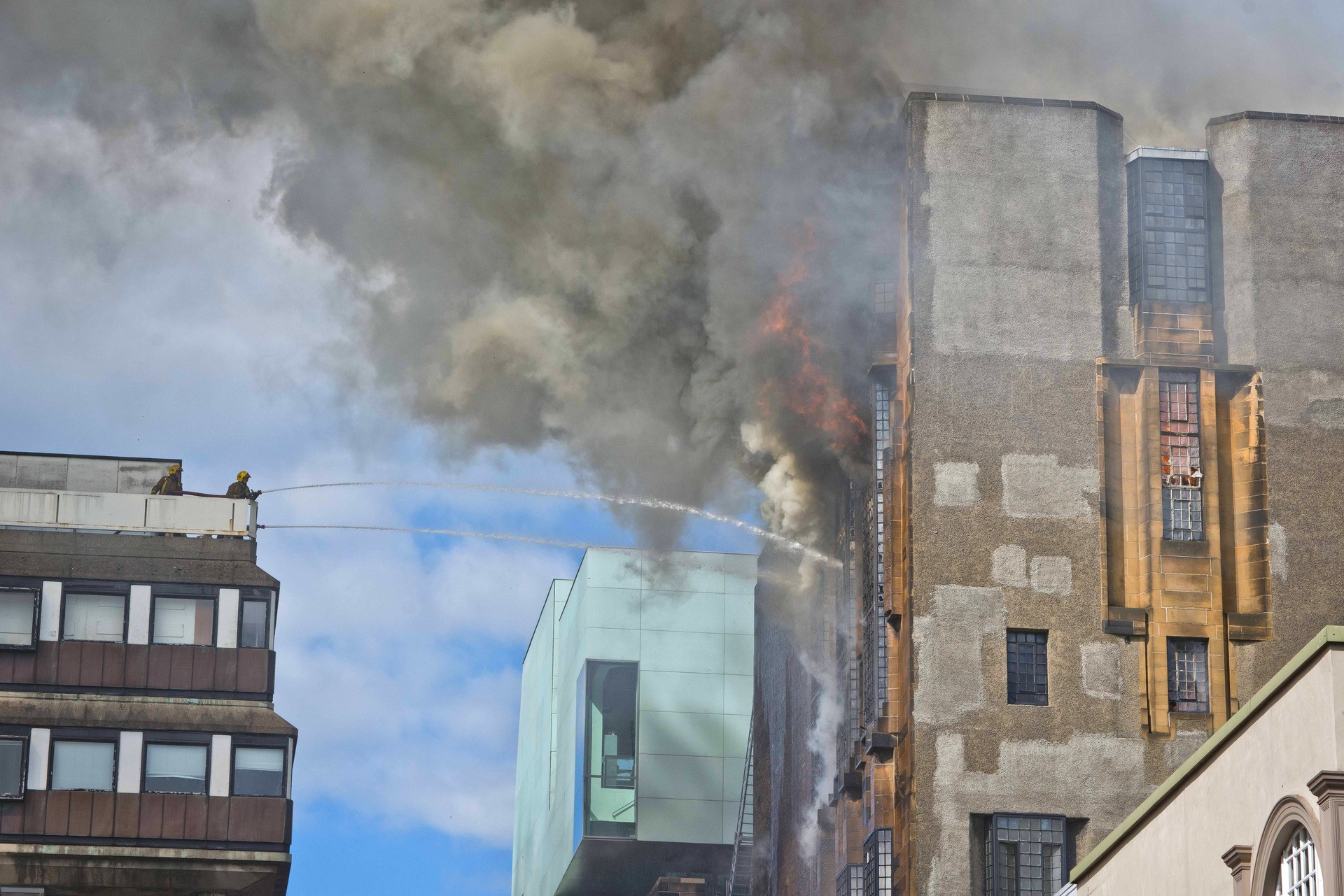 GLASGOW, SCOTLAND - MAY 23:  Fire crews tackle a fire at the Glasgow School of Art Charles Rennie Mackintosh Building on May 23, 2014 