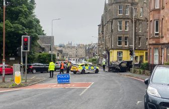 Edinburgh street cordoned off after taxi catches fire in city centre