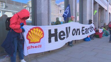 Environmentalists demonstrate outside of Shell North Sea HQ