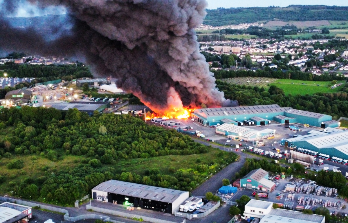 A massive plume of smoke has engulfed the sky west of Glasgow after a fire erupted near an industrial estate in Paisley.