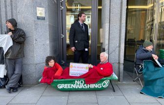 Climate campaigners stage protest at Shell Aberdeen office with washing machine and bath