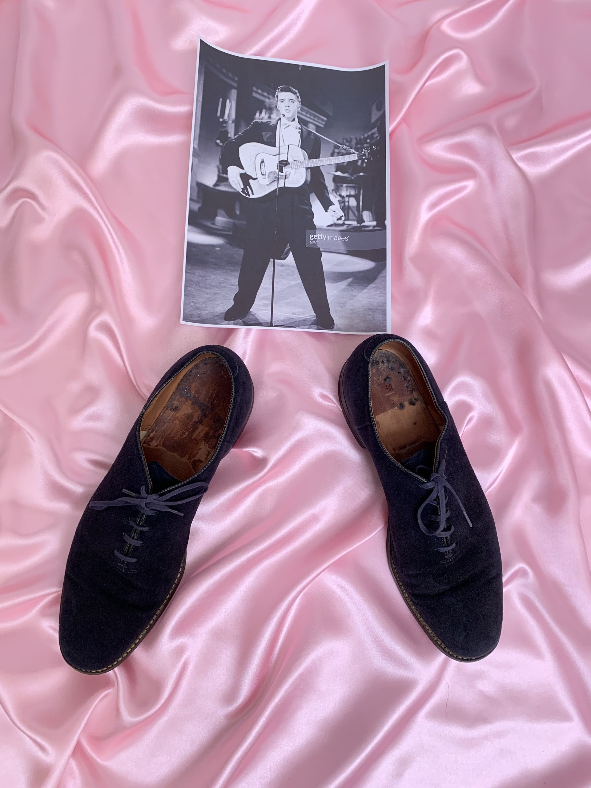 Elvis Presley’s blue suede shoes fetched £120,000 (Henry Aldridge & Son Auctions/PA)