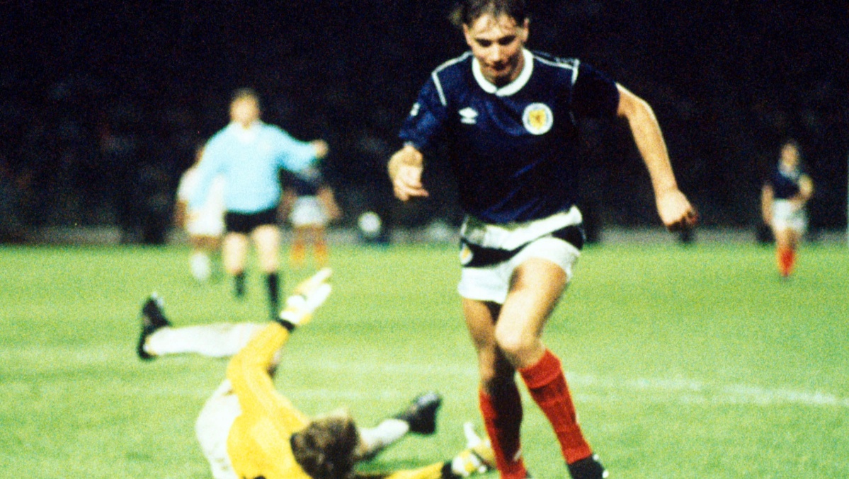Ally McCoist rounds the keeper to score his second of the night. 