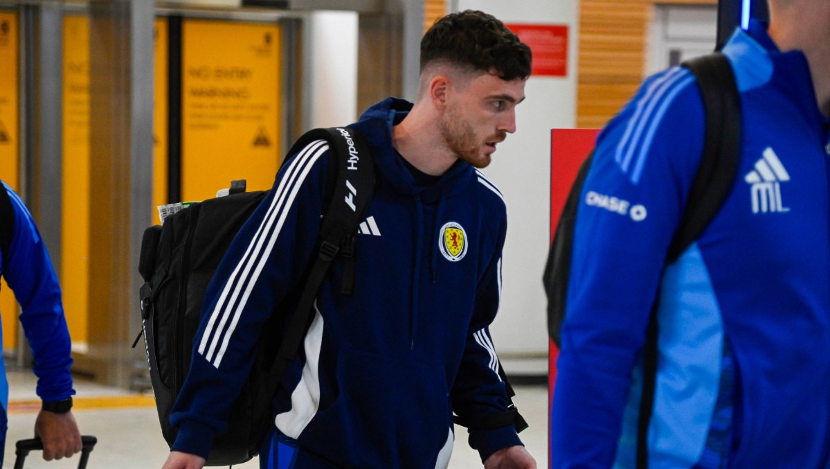 Dejected Scotland team arrives home at Glasgow Airport after heartbreaking Euros exit