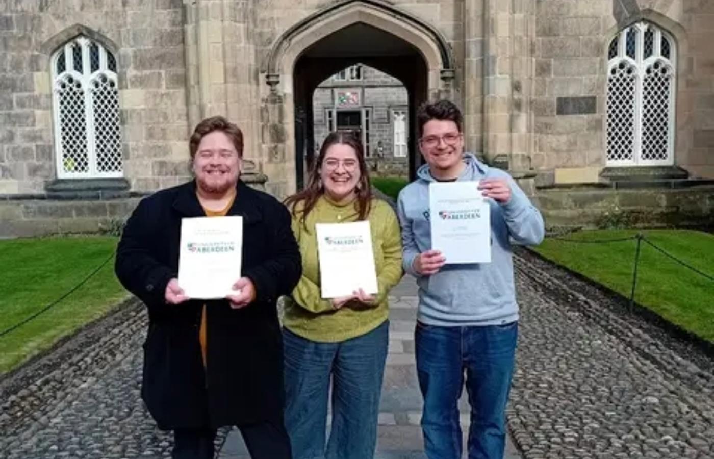 Josh (left), Anna (middle) and John (right) celebrated their graduation together on Tuesday at the University of Aberdeen.