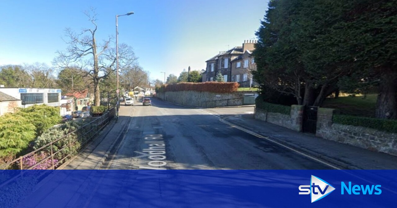 Woman struck by car rushed to hospital as road closed in Edinburgh ...