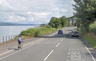 Man rescued by firefighters after car leaves road and crashes onto beachfront in Gourock