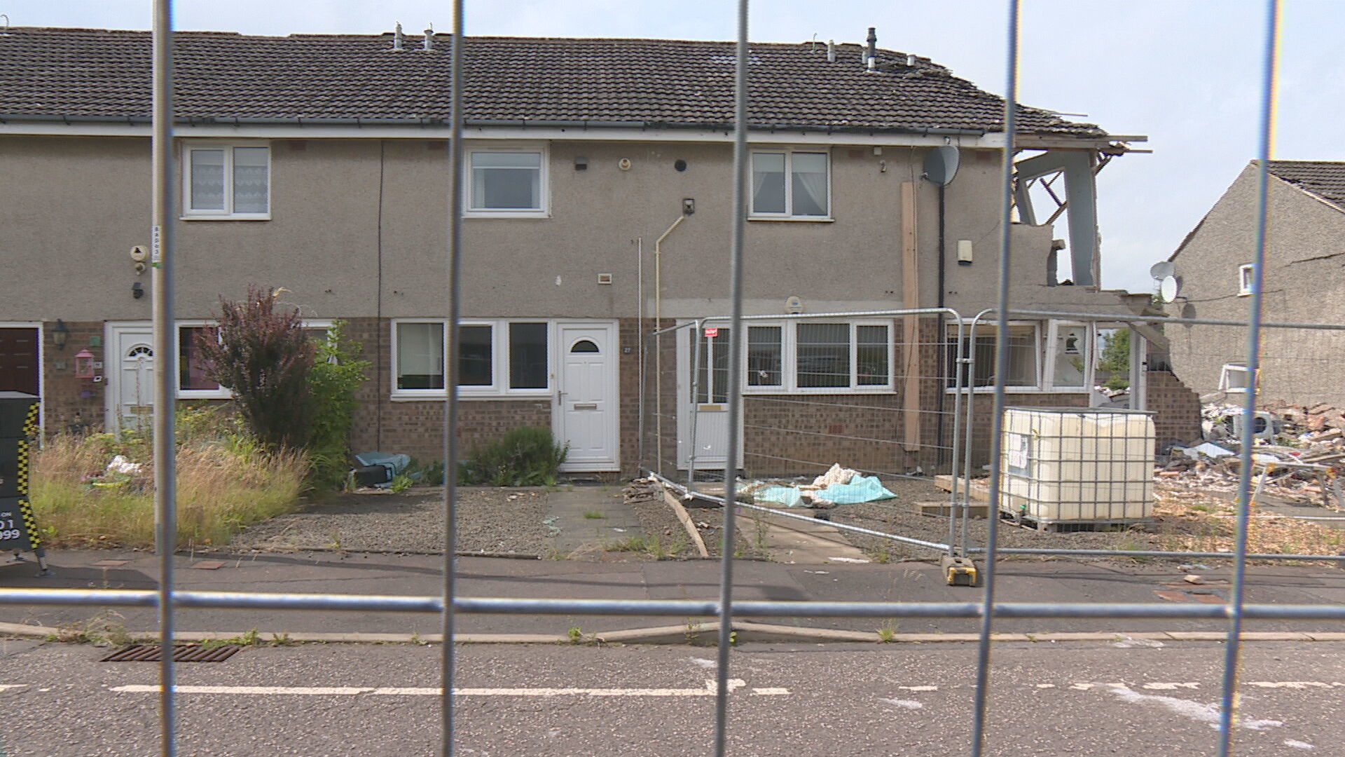 The street remains fenced off several months later with homeowners given no indication of when they might be able to return home.