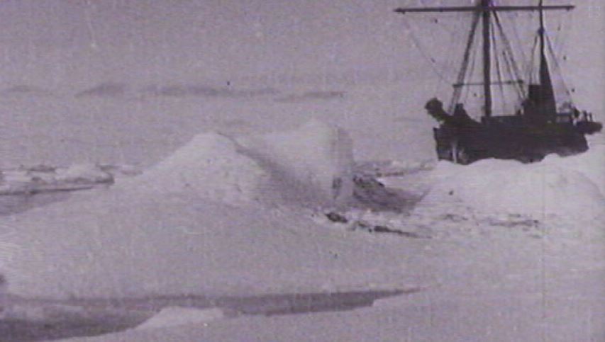 Historic whaling ship in ice covered waters.