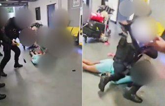 Police officer suspended after video shows man being kicked and stamped on at Manchester Airport
