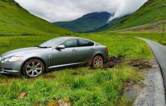 ‘Not quite James Bond’ Jaguar driver stuck in mud overnight at Glen Coe beauty spot