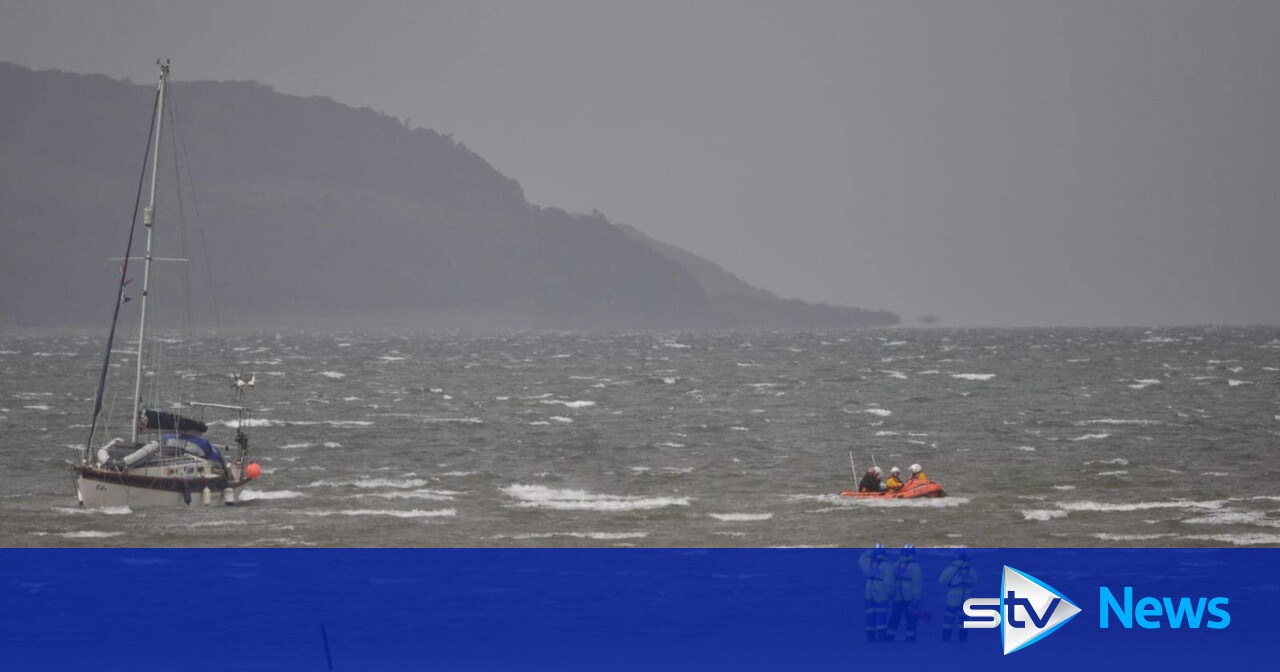 Two rescued after sailing boat ran aground off coast of Scotland