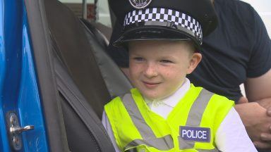 Police-obsessed youngster visits more than 50 stations across Scotland