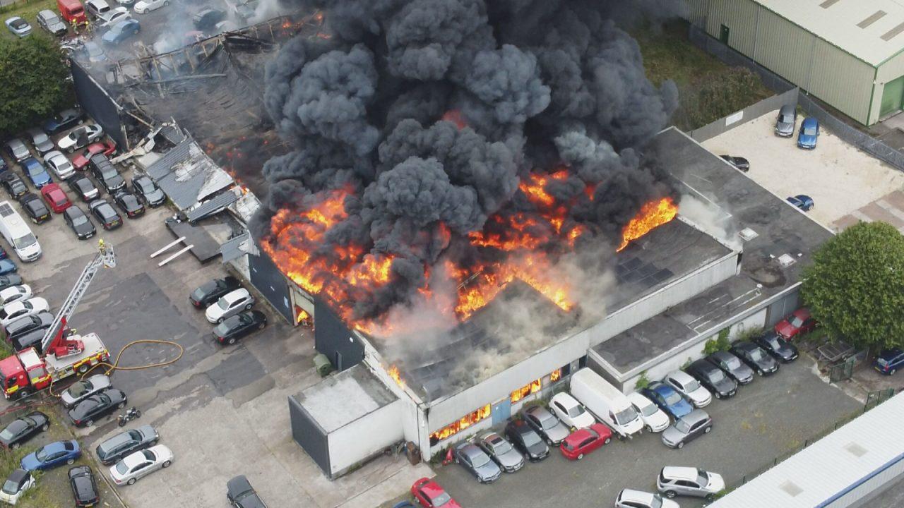 Crews remain overnight after blaze engulfs car repair workshop at Houston Industrial Estate