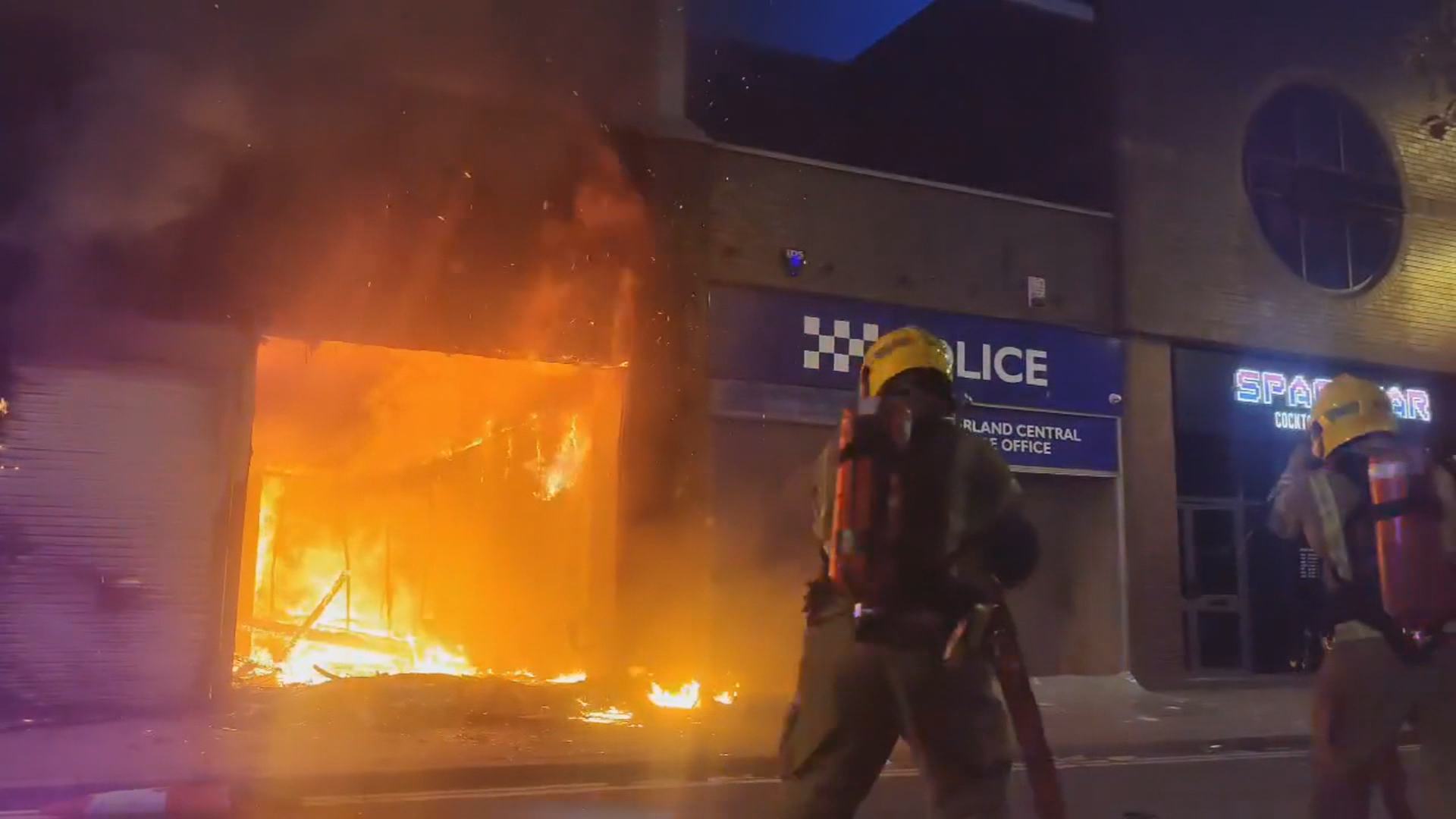 Police station set on fire in Sunderland, England, during riots.