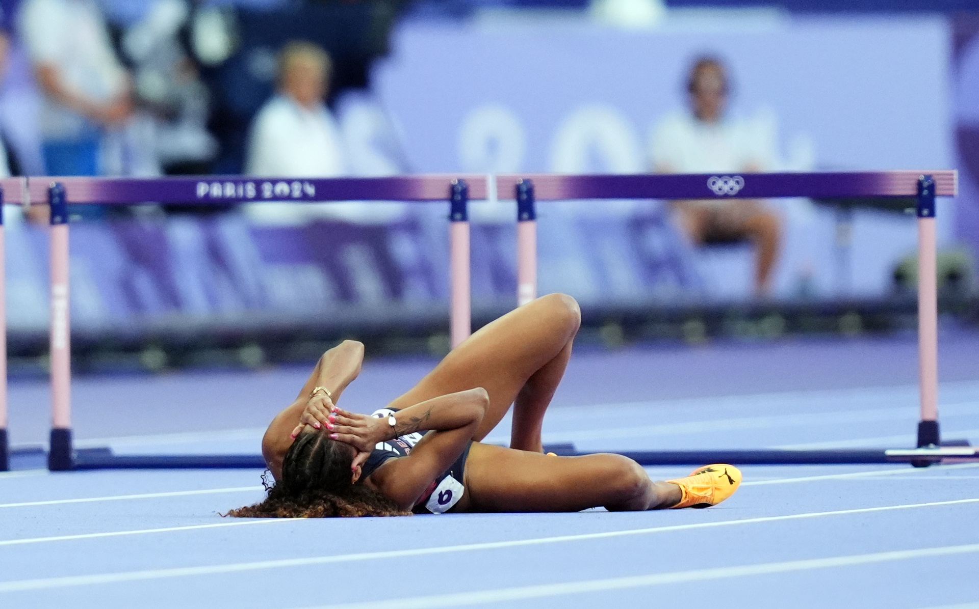 Great Britain's Lina Nielsen after falling during the Women's 400m Hurdles Semi-Final at the Stade de France on the eleventh day of the 2024 Paris Olympic Games in France. 