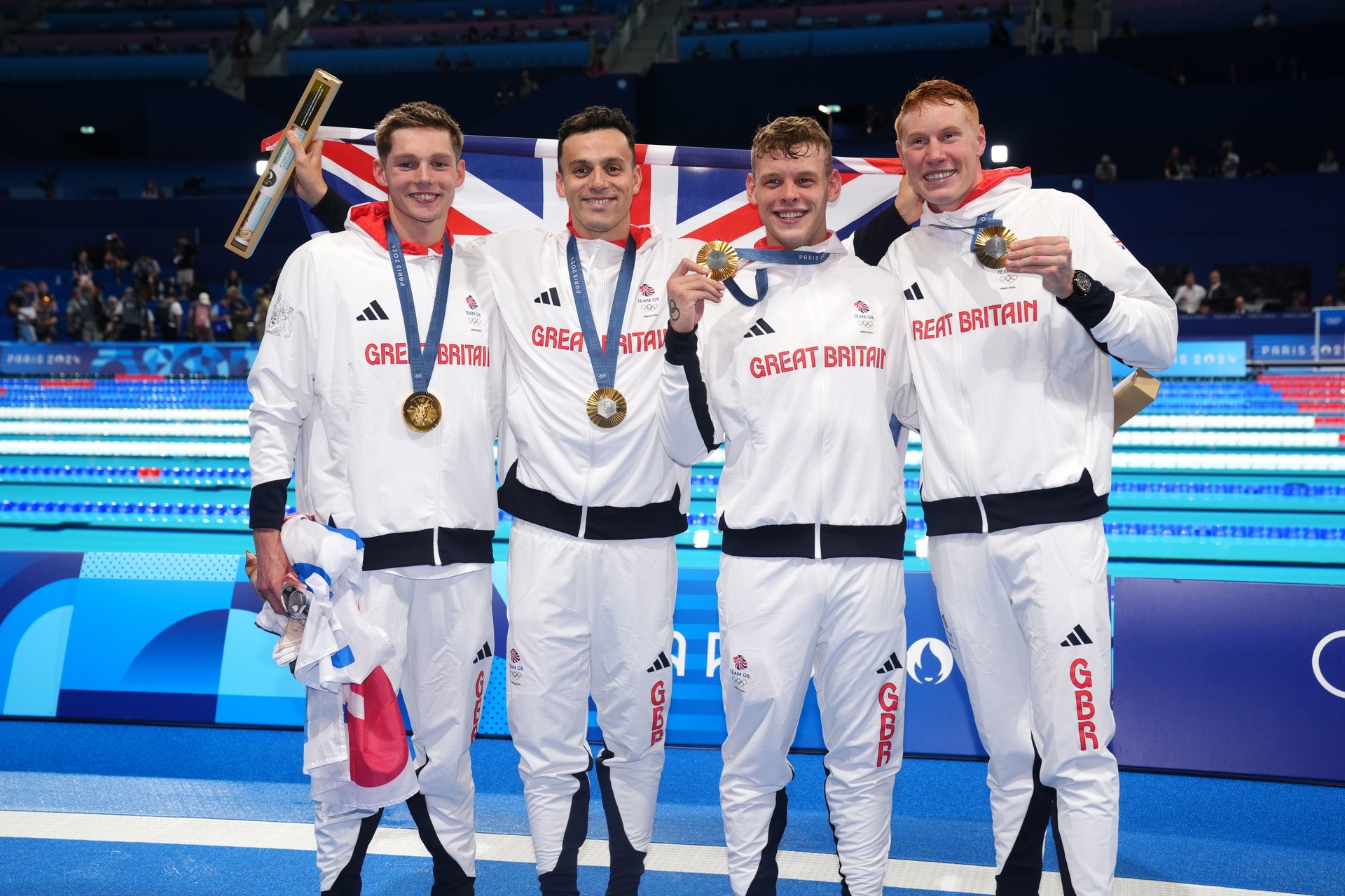 Tom Dean, right, made history earlier this week alongside Duncan Scott, James Guy and Matt Richards (John Walton/PA).