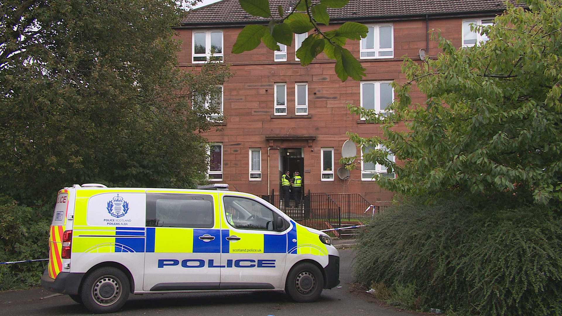 Brodie MacGregor, 23, was pronounced dead by emergency services who had been called to the property on Elmvale Street in the Springburn area of Glasgow at around 10.15am on Monday.