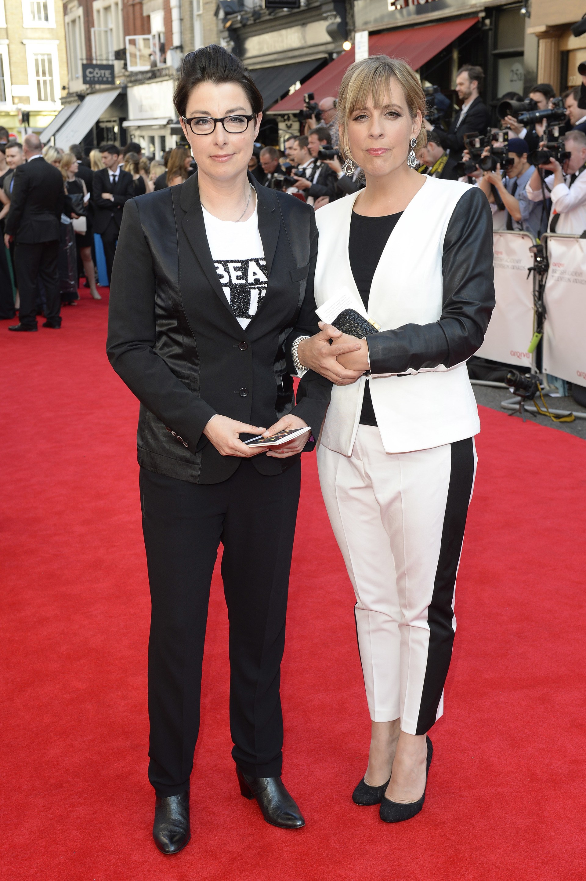 Sue Perkins and Mel Giedroyc attend the Arqiva British Academy Television Awards at Theatre Royal on May 18, 2014 in London, England. 