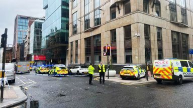 Police Scotland lock down Glasgow City Centre street after woman struck by car