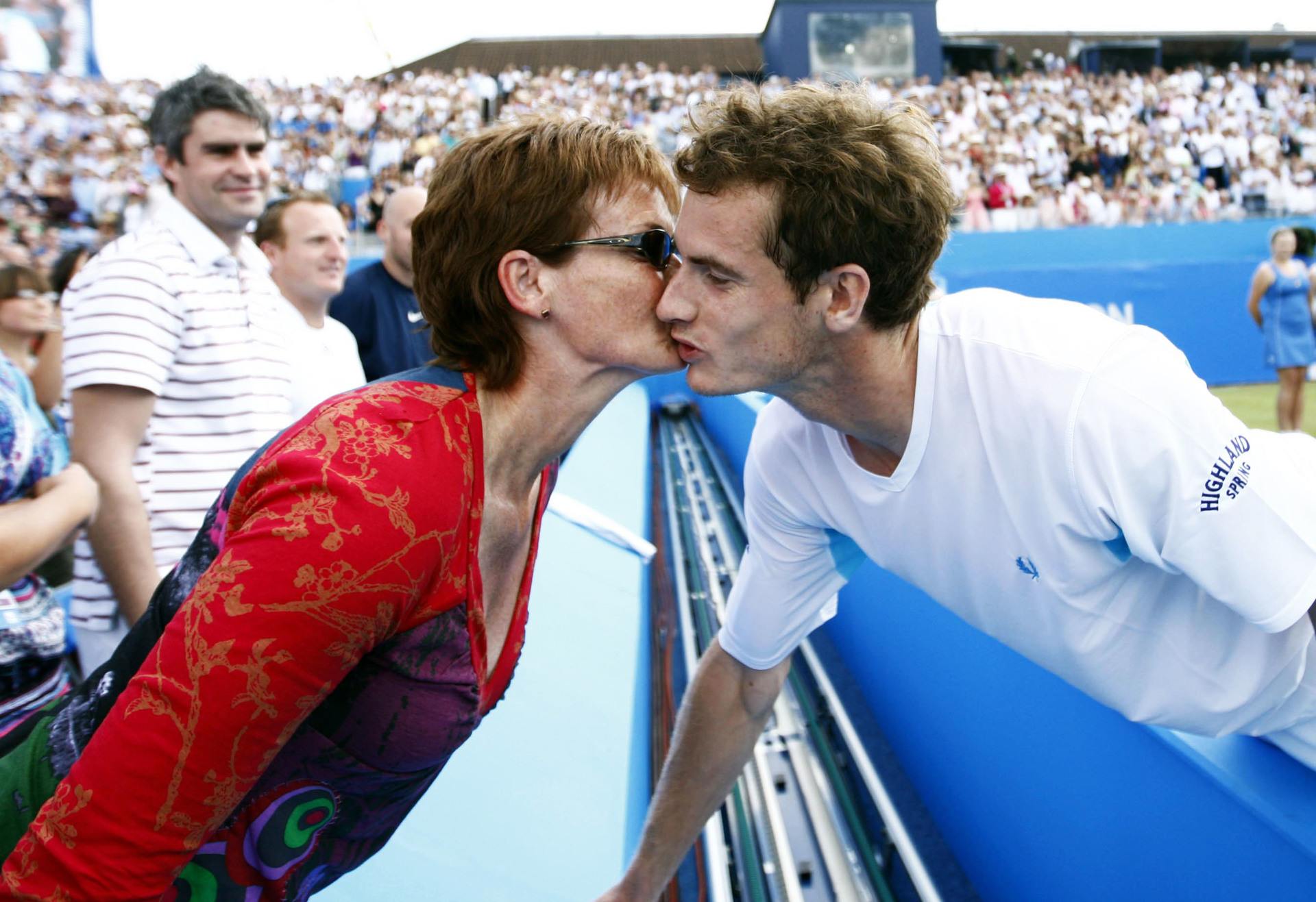 A kiss from mum Judy after Andy Murray wins the AEGON Championships in 2009.