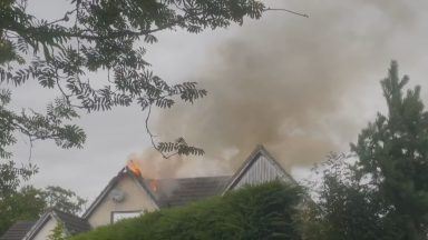 Family escape blaze after lightning sets home on fire