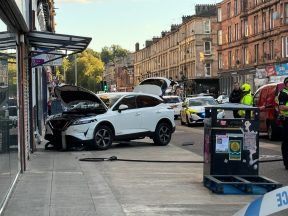 Glasgow residents evacuated from homes after car crashes into shop on Victoria Road