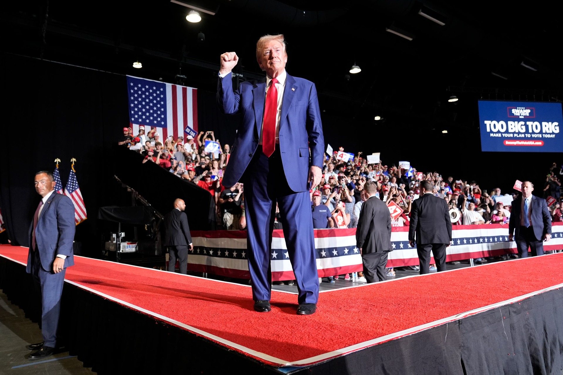 Republican presidential nominee Donald Trump departs after speaking during a campaign event at the World Market Centre in Las Vegas on Friday (Alex Brandon/AP). 