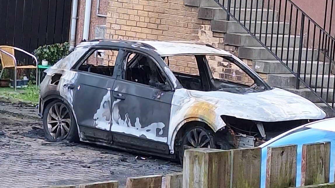 The car was completely destroyed by the fire on Tuesday morning