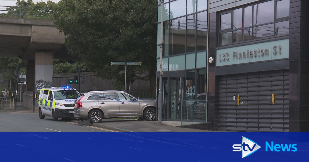 Woman taken to hospital after car crashes into Finnieston office ...