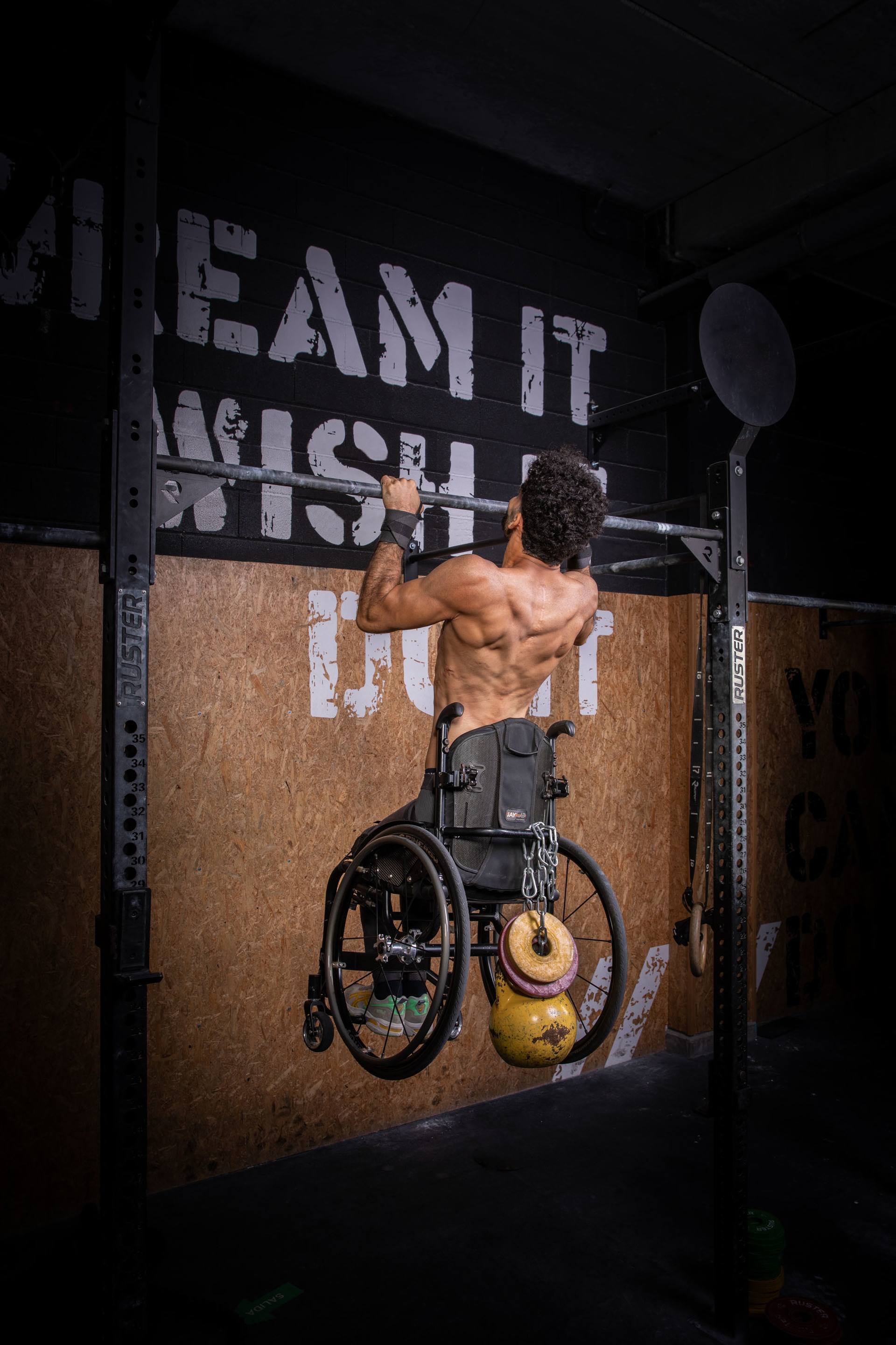 Adnan Almousa achieved the heaviest single repetition weighted pull-up in a wheelchair.