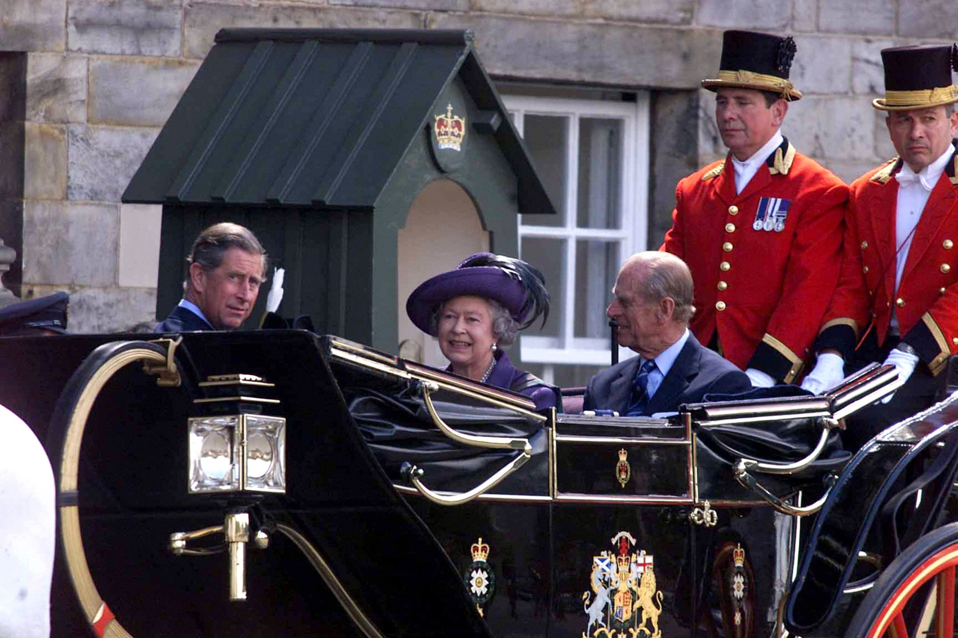 The royal family leave Holyrood House in Edinburgh for the State Opening of Scottish Parliament in 1999.