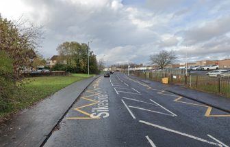 Man and woman charged and due in court as two police officers injured after stopping car in Coatbridge